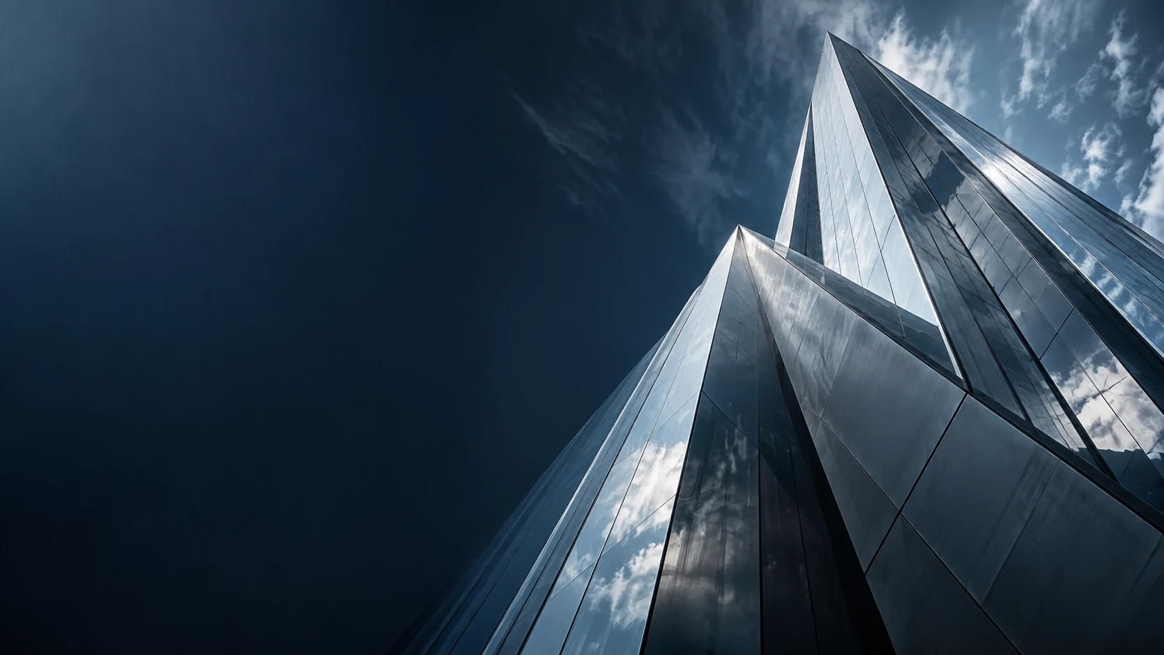 Intersecting planes of silver and glass architecture